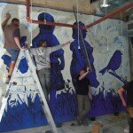 David Bromley painting going up David Bromley painting going up